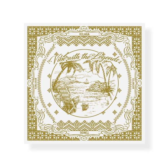 A decorative square design featuring a tropical beach scene in the center with the text “Vibe with the Legends” written above it. The illustration includes palm trees, a sailboat in the distance, a beach chair, and a coconut on the sand. The border contains intricate geometric patterns and corner flourishes, with directional Filipino words: "HILAGA" (north), "TIMOG" (south), "KANLURAN" (west), and "SILANGAN" (east). The design is rendered in a single shade of gold on a white background.